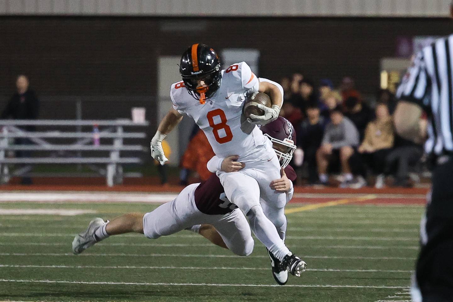 Lincoln-Way West’s Ryan Stiglic runs for a first down after a catch against Lockport on Friday, Oct. 18, 2024 in Lockport.