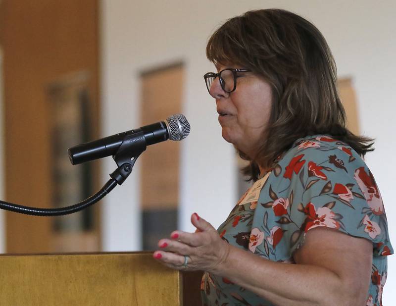 Award recipient Lynn Caccavallo speaks during the Northwest Herald's Women of Distinction award luncheon Wednesday June 4, 2025, at Boulder Ridge Country Club, in Lake in the Hills. The luncheon recognized ten women in the community as Women of Distinction.