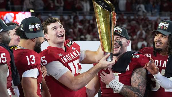 Indiana completes undefeated season and wins first national title, beating Miami 27-21 in CFP final