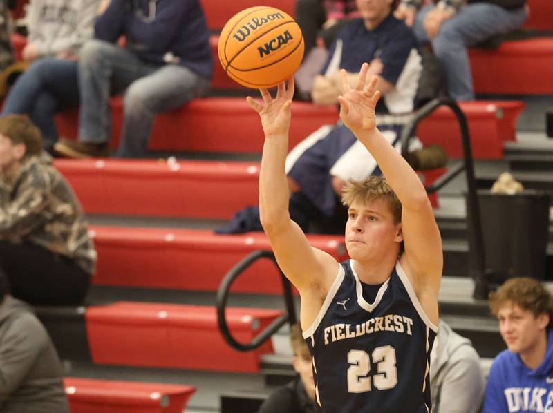 Fieldcrest's Eli Gerdes shoots a wide open shot against Hall during the Colmone Classic on Friday, Dec. 12, 2025 at Hall High School.