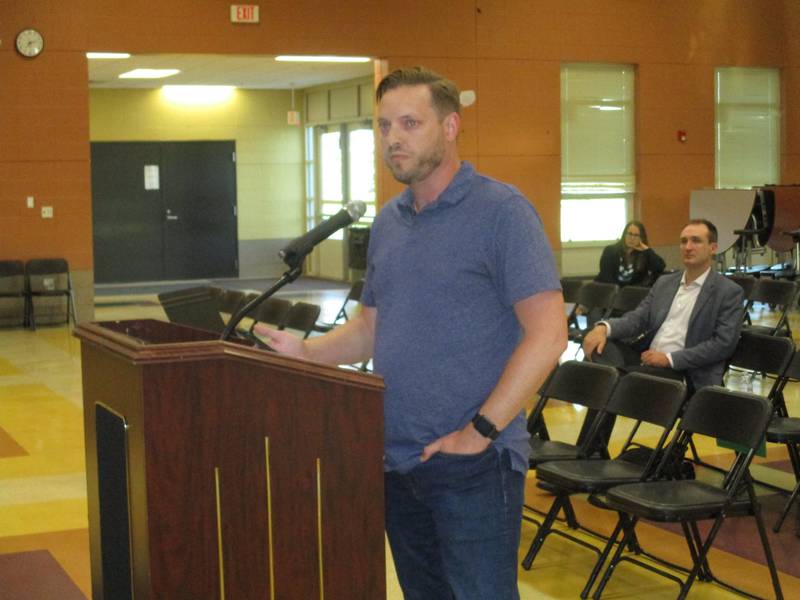 Prescott Mill single-family homeowner association president Nathan Brown asks the Oswego School District 308 Board of Education to create more student vehicle parking spaces at Oswego East High School, during a forum on May 16, 2022 at Plank Junior High School. (Mark Foster -- mfoster@shawmedia.com)