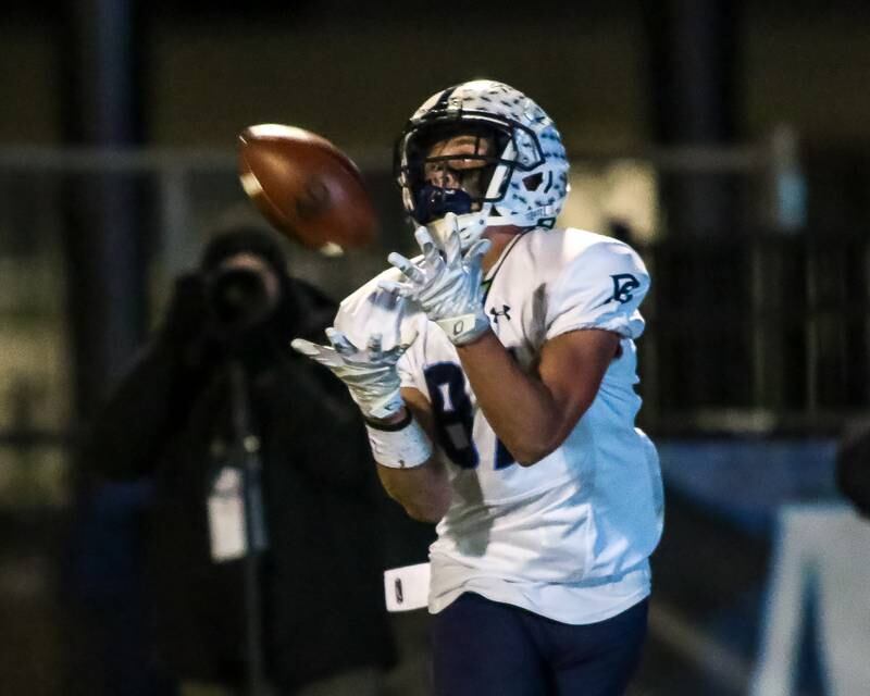 Plainfield South's Logan Weiss (87) catches a touchdown during Class 8A Playoff football game between Plainfield South at Downers Grove South on Friday, Nov 1, 2024  in Downers Grove.