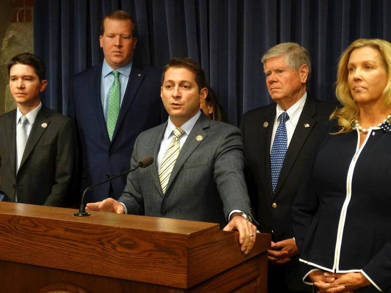 State Sen. Jason Barickman (R-Bloomington) speaks at a recent event with fellow Republican lawmakers.
