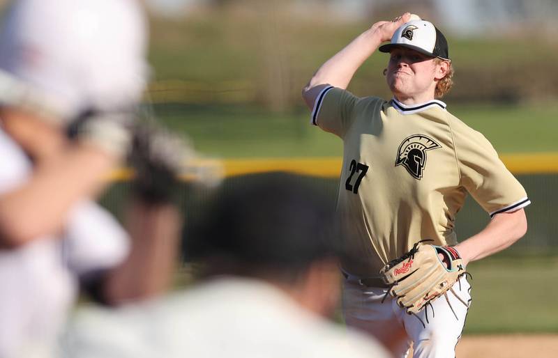 Sycamore's Jimmy Amptmann delivers a pitch during their game against Kaneland Thursday, May 4, 2023, at Kaneland High School.