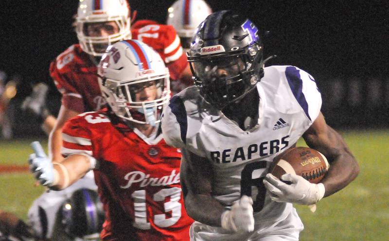 Plano's Waleed Johnson (6) outruns Ottawa's Ryder Miller at King Field on Friday, Aug. 26, 2022.