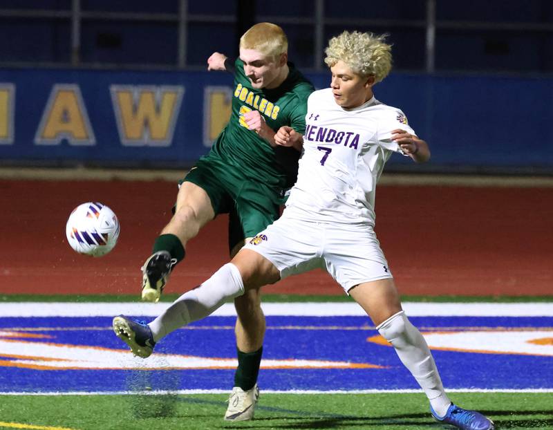 Coal City's Parker Jacovec kicks the ball away from Mendota's Isaac Diaz Thursday, Nov. 6, 2025, during their Class 1A state semifinal game at Hoffman Estates High School.