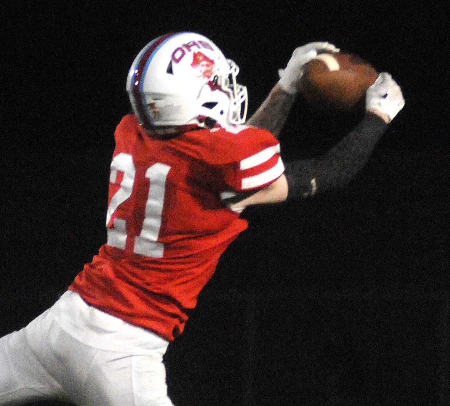 Ottawa's Garrett Cupples makes a nine yard interception return for a touchdown against Harvard at King Field on Friday, Sept. 8, 2023.