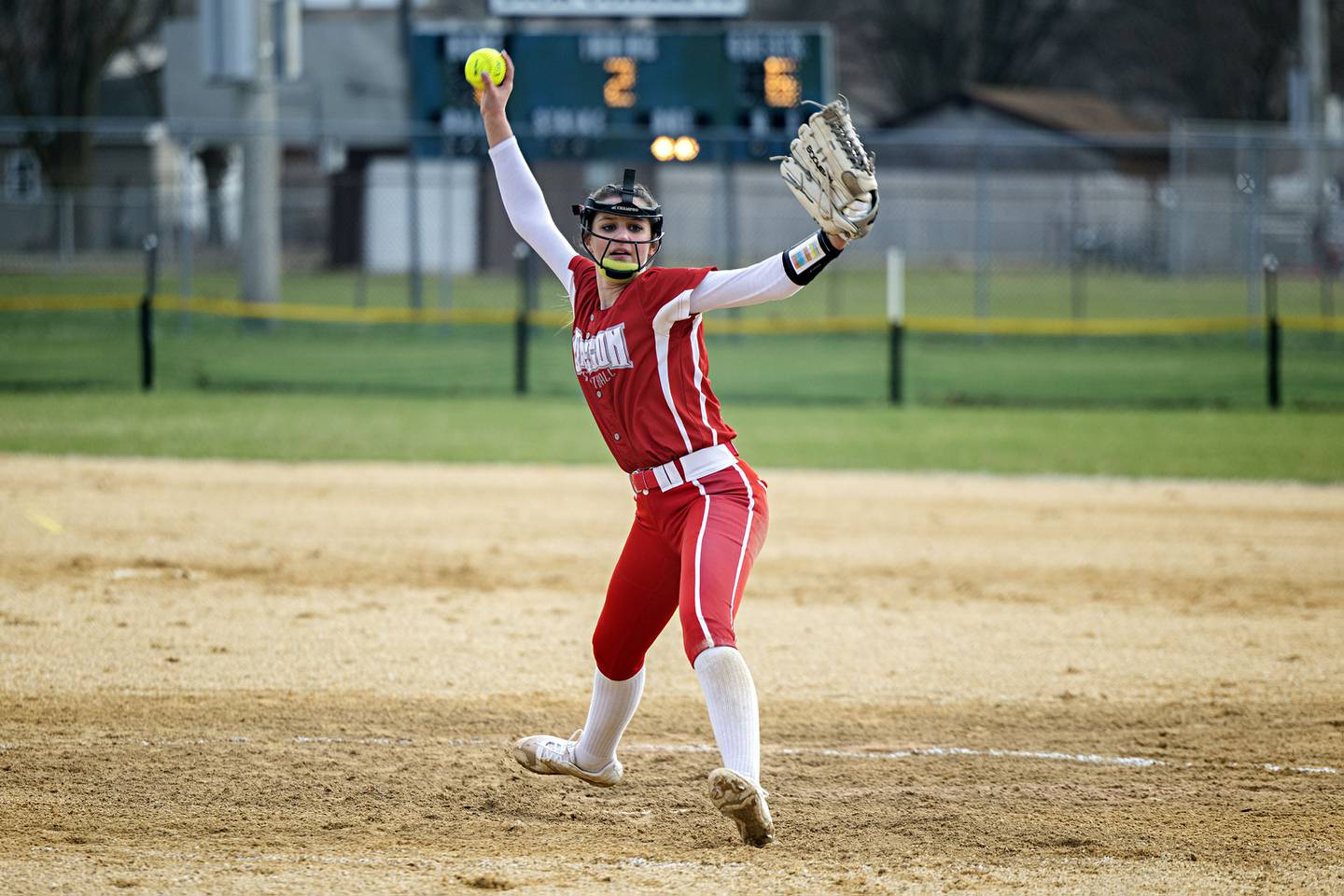 Oregon’s Ava Hackman fires a pitch Wednesday, April 5, 2023 against Dixon.