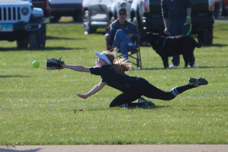 Kaneland's Izzy Stombres makes a diving play against Sycamore  on April 21,2022 in Sycamore.