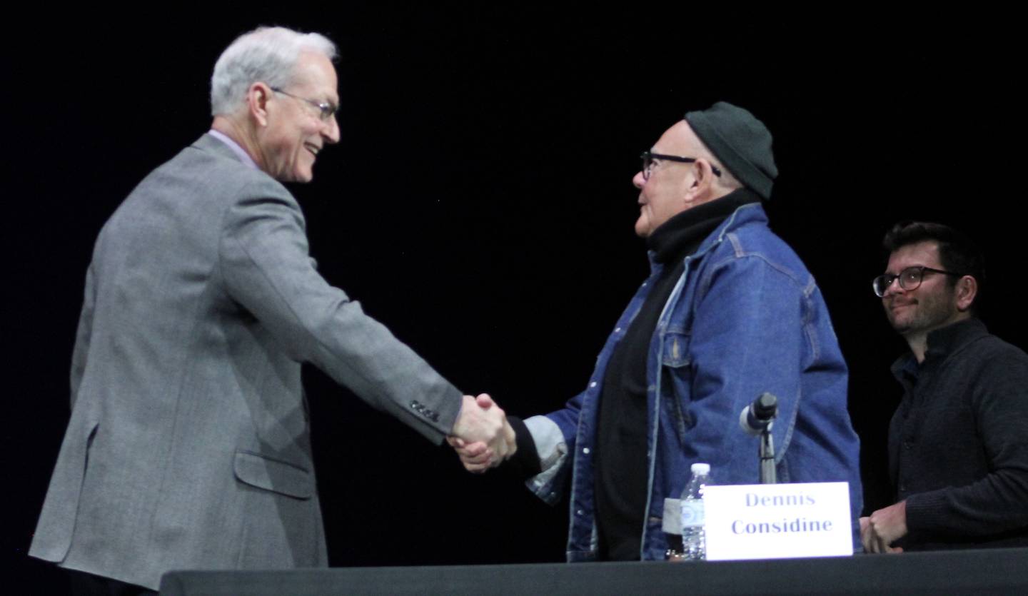 Glen Hughes, left, and Dennis Considine shake hands after the Dixon mayoral candidate portion of a forum conducted by Discover Dixon on Thursday, March 16, 2023, at Dixon Theatre.
