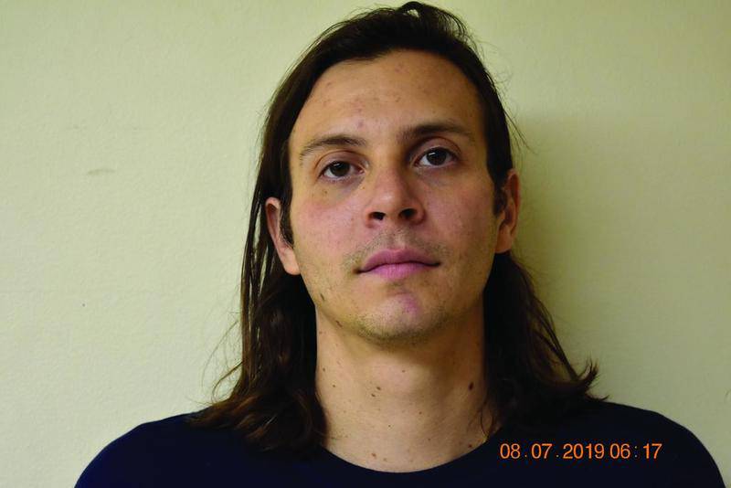 John F. Karas was charged with six felonies in connection with driving over a roundabout in Sugar Grove