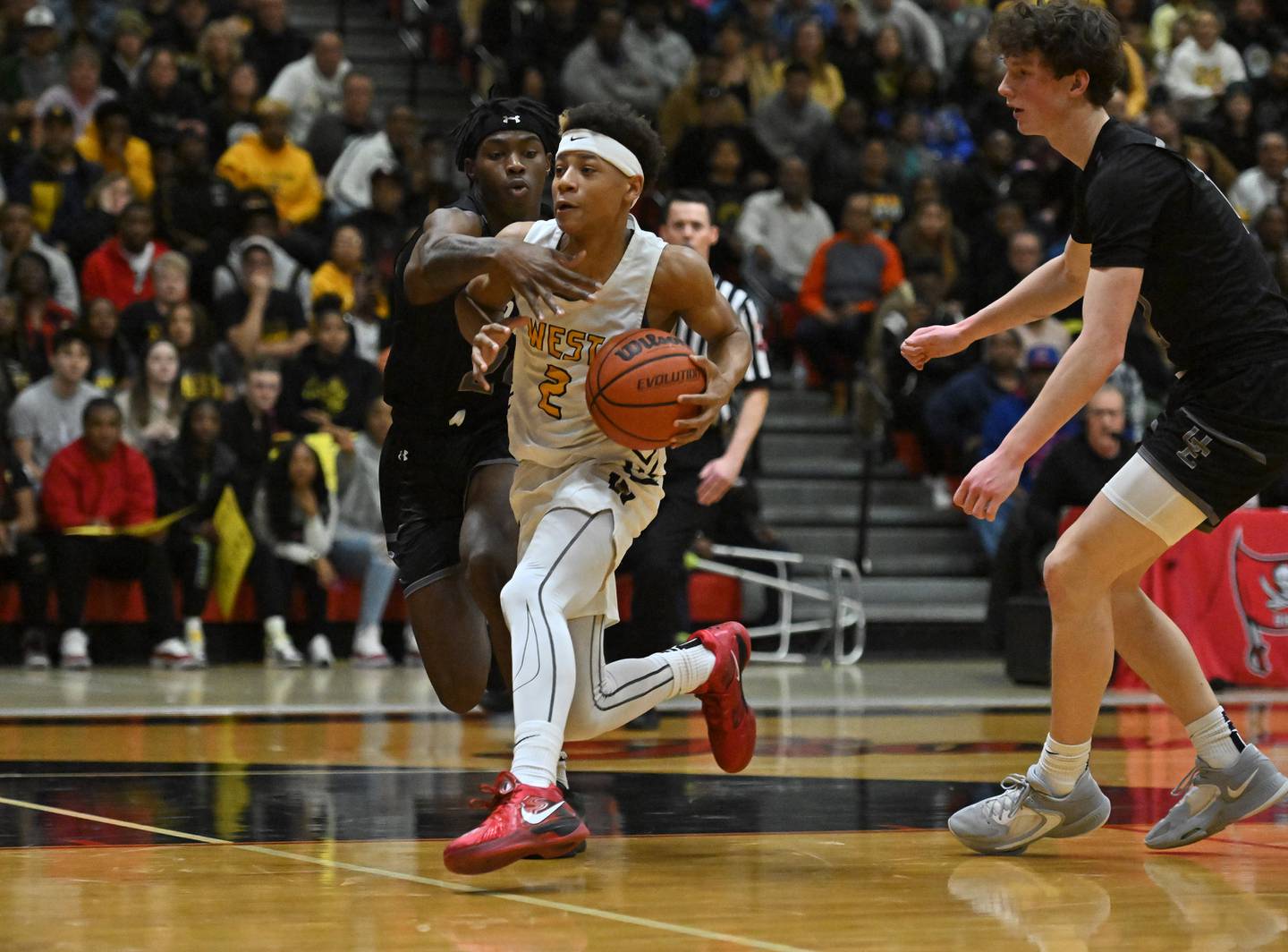 Joliet West's Jeremiah Fears drives to the basket against Oswego East during the Class 4A Bolingbrook Sectional Championship on Friday, March. 03, 2023, at Bolingbrook.