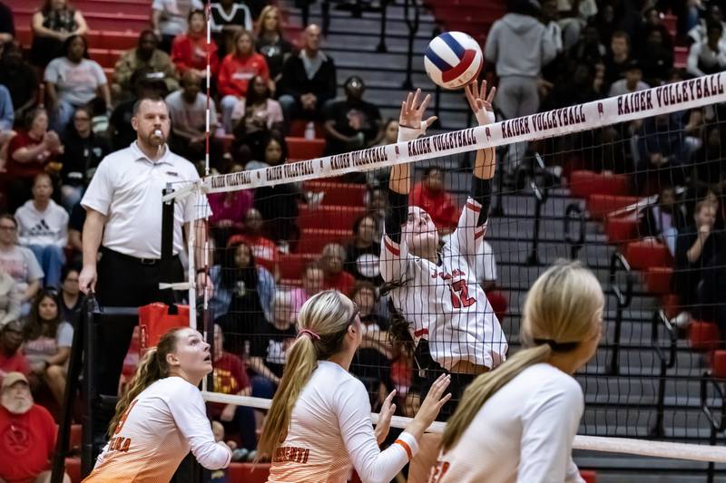 Bolingbrook's Catherine Daniels sets up a teammate during a varsity volleyball home game against Minooka on Sept. 25, 2025.