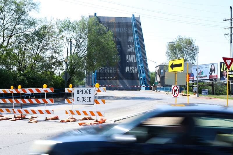 Traffic is redirected southbound on Chicago Street as Ruby Street Bridge in downtown Joliet is closed on Monday, May 6, 2024.