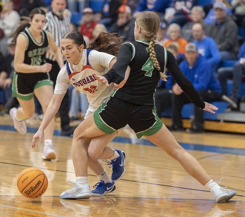 Eastland’s Sienna Peterson is fouled by Wethersfield’s Abbey Carman Tuesday, Feb. 24, 2026, in the Class 1A sectional at Eastland High School.