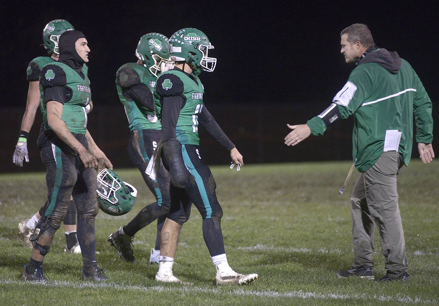 Seneca football coach Terry Maxwell lauds his team during a timeout of their first-round Class 2A playoff win at home against Dwight/Gardner-South Wilmington last season.