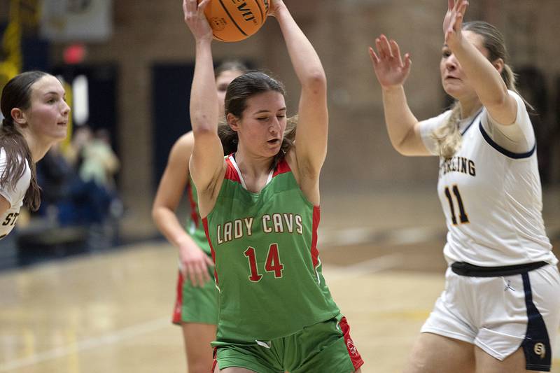 LaSalle-Peru’s Drew Depenbrock pulls down a rebound against Sterling Tuesday, Dec. 3, 2024, at Sterling High School.
