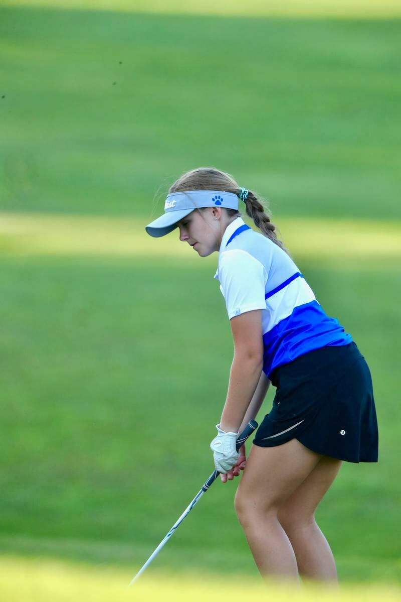 Princeton's Emma Kruse-Carter watches her iron shot during Thursday's meet at Wyaton Hills.