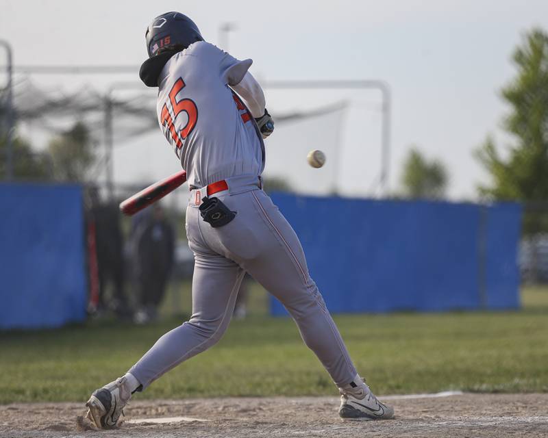 Oswego's Donny Williams (15) swings at a pitch during baseball game between Oswego East at Oswego. Monday, May 19, 2025 in Oswego.