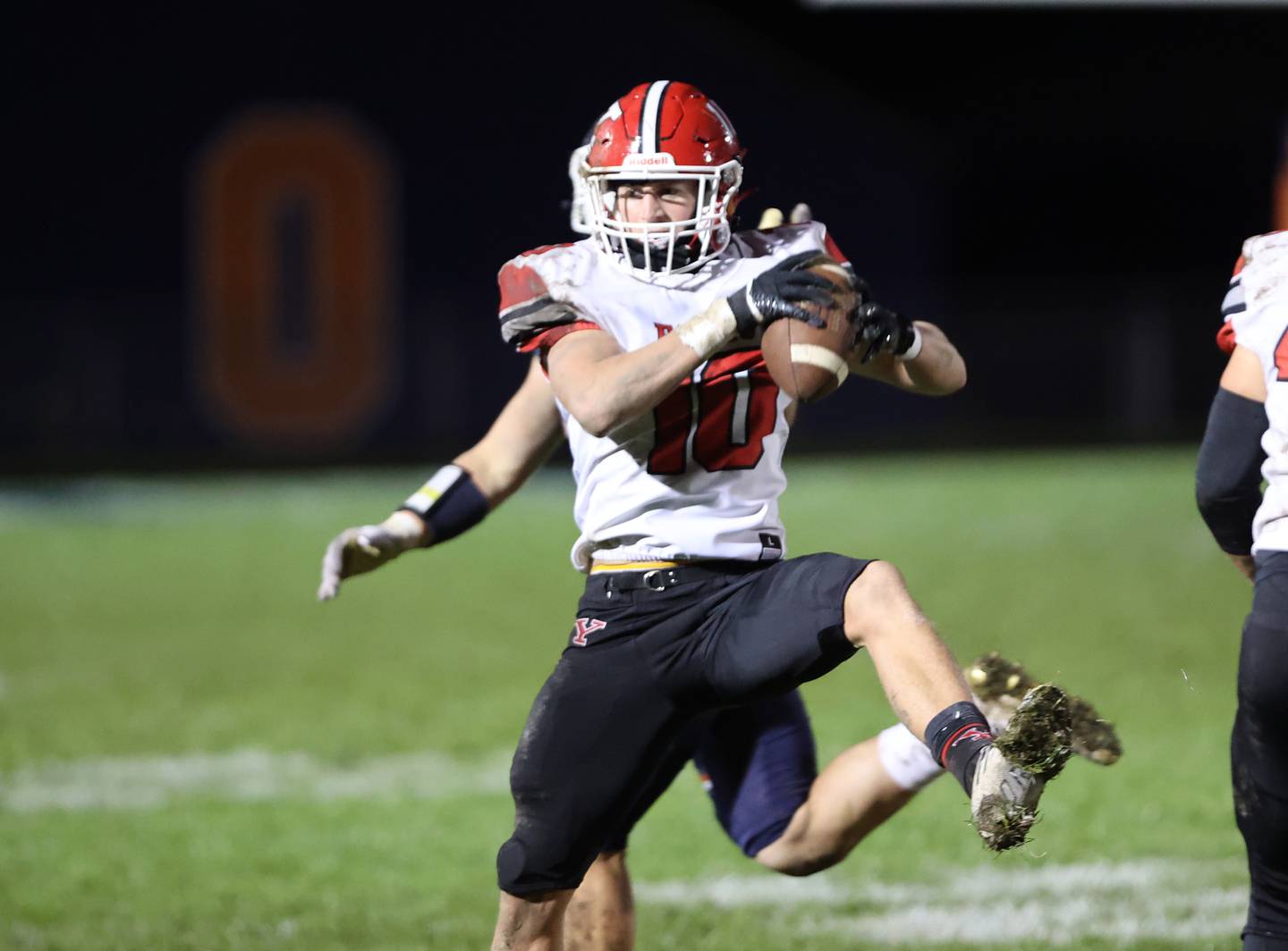 Yorkville’s Luke Zook (10) makes an interception during the boys varsity football game against Oswego on Friday, Oct. 6, 2023 in Oswego.