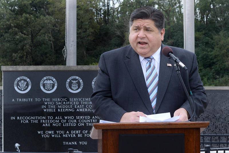 Gov. JB Pritzker speaks at The Middle East Conflicts Memorial Wall in Marseilles during a ceremony honoring Gold Star families for Gold Star Mother's Day.