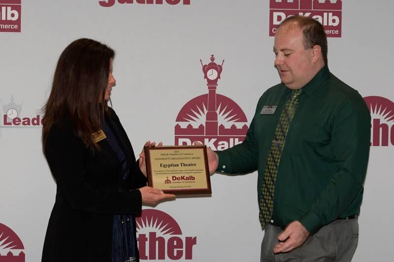 DeKalb Chamber of Commerce Board Chair Tia Anderson presents the 2022 Nonprofit Organization Award to  Egyptian Theatre Executive Director Alex Nerad during DeKalb’s Annual Celebration Dinner at the Barsema Alumni & Visitors Center on Thursday, Feb. 3, 2022.