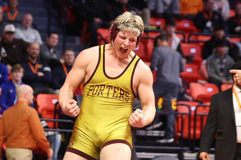 Lockport’s Andrew Blackburn-Forst pumps his fists after a win over Marist’s Ghee Rachal in the Class 3A 220lb. championship at State Farm Center in Champaign. Saturday, Feb. 19, 2022, in Champaign.