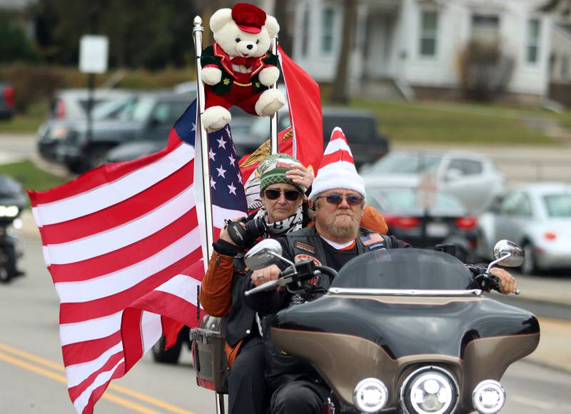 Motorcyclists cruise during the Toys for Tots Parade on Sunday, Nov. 24, 2024, in downtown McHenry.