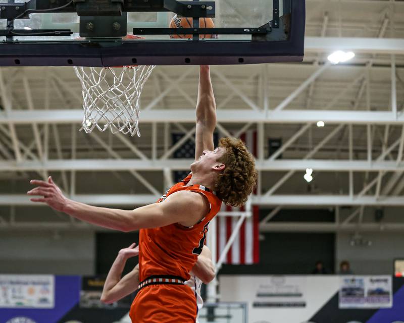 Sandwich's Dom Rome (22) dunks during their basketball game between Sandwich at Plano. Jan 27, 2025 in Plano.