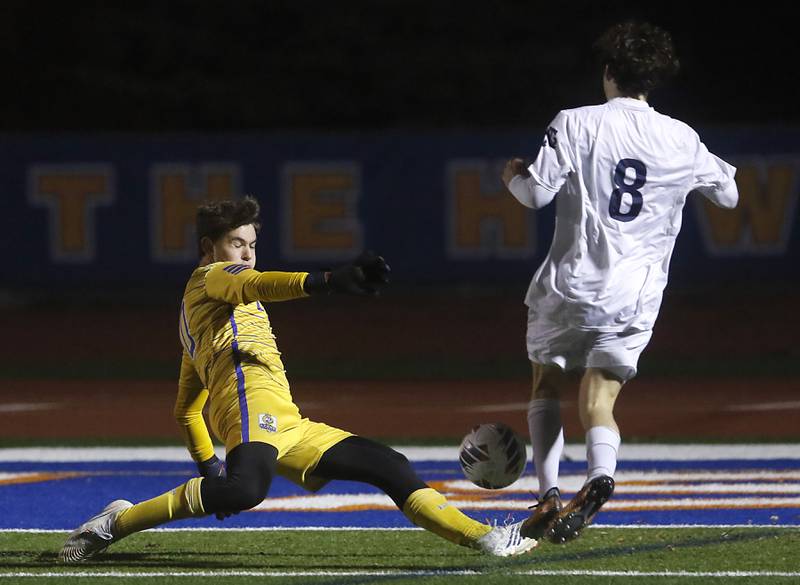 Lyons Township's Tyler Balon plays the ball as nt8\ tries to score during the IHSA Class 3A state championship soccer match on Saturday, Nov. 4, 2023, at Hoffman Estates High School.