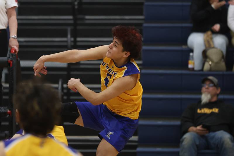 Joliet Central’s Felipe Andres Vega follows through a kill against Joliet Catholic on Wednesday, April 1, 2026 in Joliet.