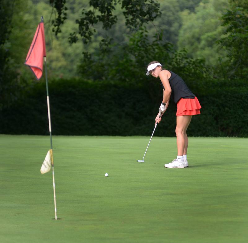 Erie-Prophetstown's Michelle Naftzger watches her putt during a Monday, Aug. 18, 2025 match with Oregon High School at Silver Ridge Golf Course north of Oregon.