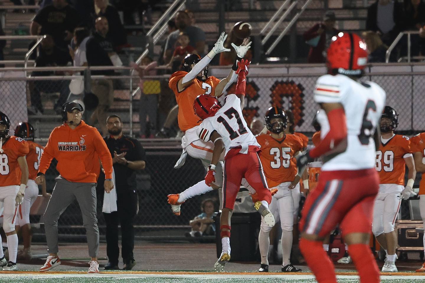 Lincoln-Way West’s Jacob Bereza pulls in a catch and turns it into a 72 yard touchdown against Bolingbrook on Friday, Sept. 22 in New Lenox.