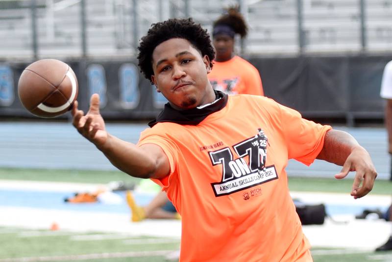 Tyjuane Stewart throws a pass during a game of 7-on-7 at the sixth annual Jonathan Ward Skills Camp at Kankakee High School, June 14, 2025.