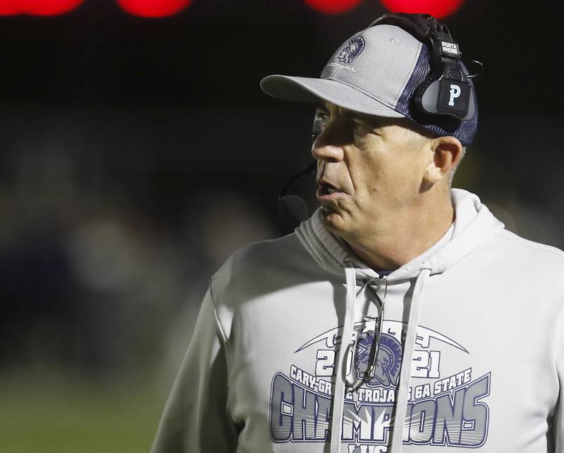 Cary-Crove Head Coach Brad Seaburg watches as his team falls behind by 17 points  during an IHSA Class 5A quarterfinal playoff football game against Belvidere North on Friday, November 14, 2025, at Cary-Grove High School, in Cary.