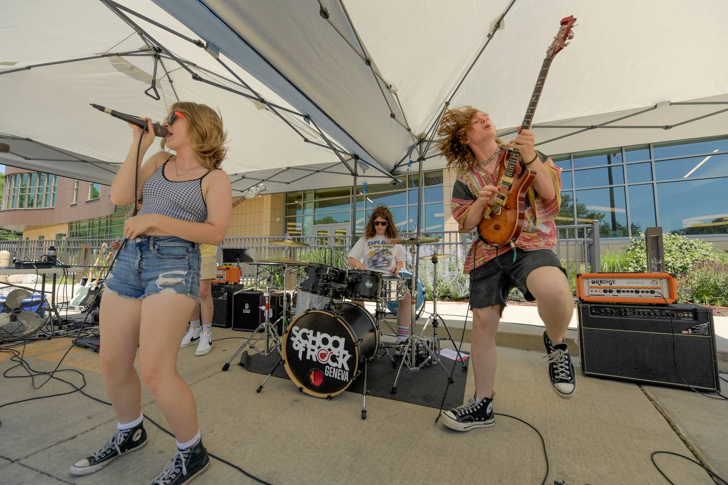 Students from the School of Rock Geneva rock out some music to entertain families during the Swedish Days Kids Day on Friday, June 21, 2024.