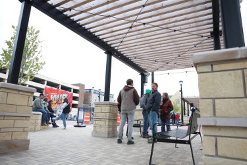 Visitors gather at the opening of the new City Square in downtown Joliet on Friday, May 1, 2026.