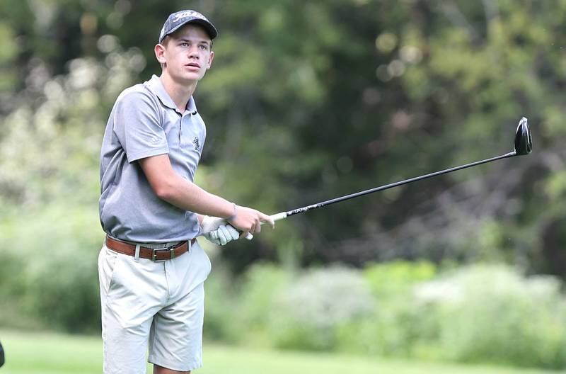 Kaneland's Brad Franck watches his tee shot on the 3rd hole Monday, Aug. 22, 2022, during the Mark Rolfing Cup at Kishwaukee Country Club in DeKalb.