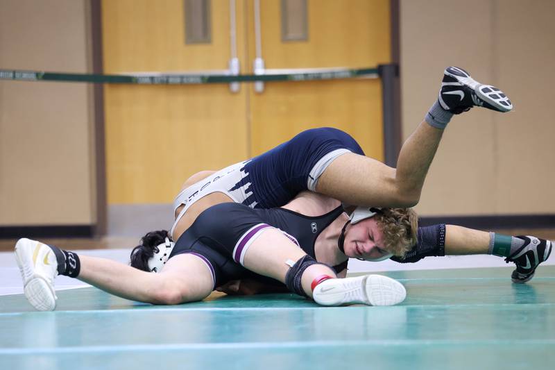 Manteno's Lucas Hetman wrestles Chicago Hope Academy's Ismael Martinez in the 165-pound third place match during the IHSA Class 1A Coal City Sectional on Saturday, Feb. 14, 2026.