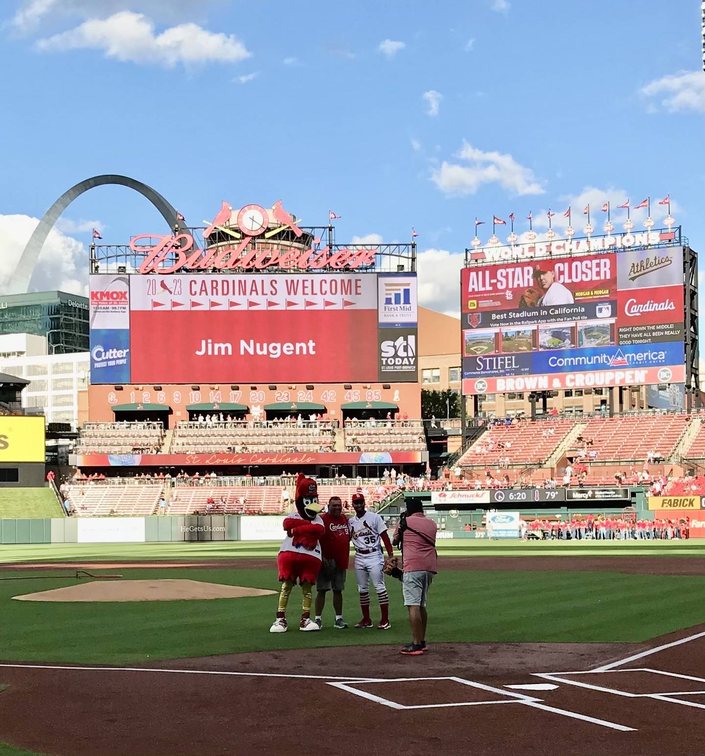 Bureau Valley K-5 PE teacher Jim Nugent was welcomed by the St. Louis Cardinals to throw out the first pitch for Monday's game by Fredbird and Cardinals infielder Jose Fermin.