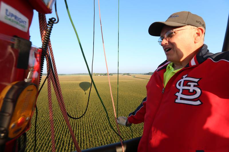 Pilot Tim Cloyd navigates a hot air balloon over a corn field south of Princeton during the 52nd annual Homestead Festival on Saturday, Sept. 9, 2023 in Princeton.