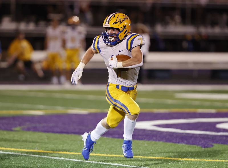 Lyons' Danny Carroll (7) runs the ball during the varsity football game between Downers Grove North and Lyons Township on Friday, Oct. 11, 2024 in Downers Grove.