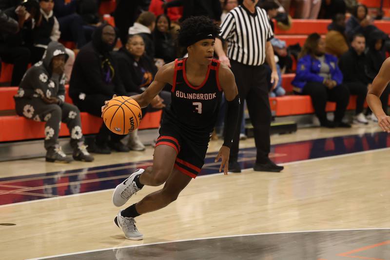 Bolingbrook's TJ Williams looks to make a play against Romeoville on Tuesday, Dec. 2, 2025 in Romeoville.