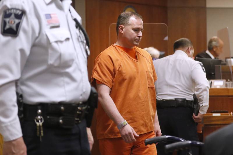 William Bishop is led back into the courtroom after a break in his sentencing hearing before McHenry County Judge Michael Coppedge on Thursday, Jan. 26, 2023, in the McHenry County courthouse in Woodstock.