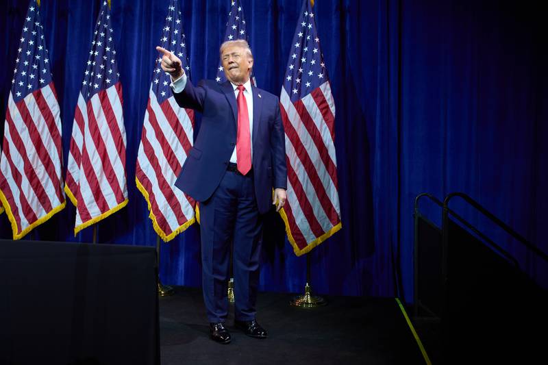 President Donald Trump points to the crowd as he walks off stage after speaking to House Republican lawmakers during their annual policy retreat, Tuesday, Jan. 6, 2026, in Washington. (AP Photo/Evan Vucci)