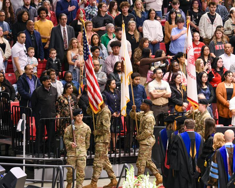 Northern Illinois University United States Army ROTC march in the colors for the National Anthem at the start of the graduation ceremony on Saturday May 9, 2026, held at the Convocation Center in DeKalb.