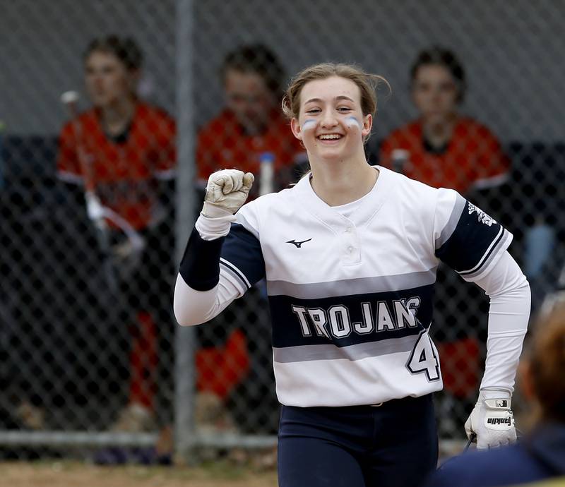 Cary-Grove’s Madilynn Crick celebrates her first home run during a Fox Valley Conference Softball game Monday, May 2, 2022, between Cary-Grove and McHenry at Cary-Grove High School.