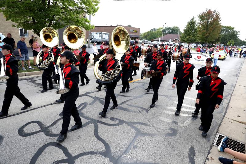 The Batavia High School marching band performs during the school’s annual homecoming parade on Wilson Street on Wednesday, Sept. 20, 2023.