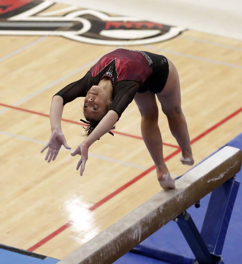 Prairie Ridge’s Gabriella Riley competes on the Balance Beam during the IHSA Girls Gymnastics State Finals Saturday February 19, 2022 at Palatine High School.