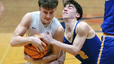 Photos: Genoa-Kingston, ACC match up in Class 2A boys basketball regional quarterfinal